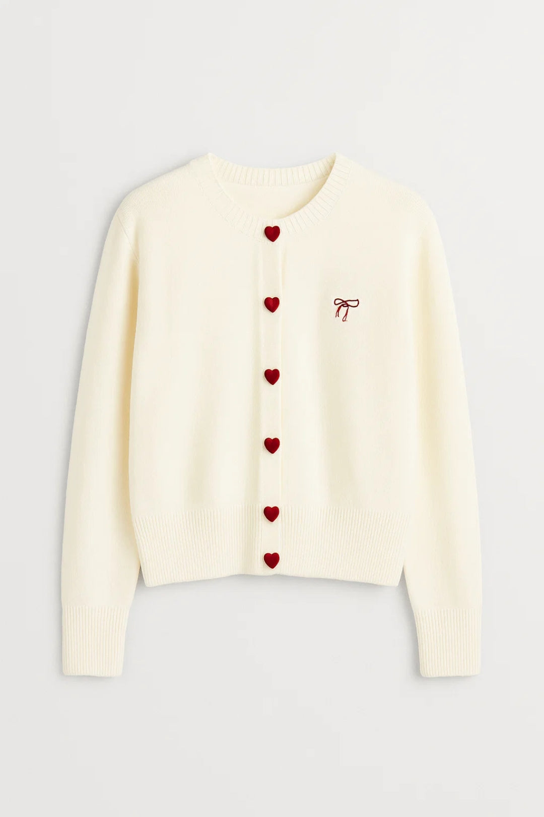 Feine Strickjacke | Herzknöpfe und Zierschleife | Sanfte Romantik